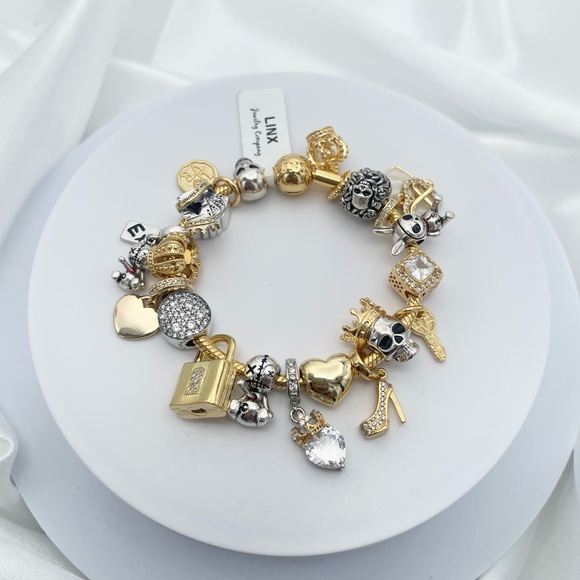 Linx Yellow Gold Snake Chain Bracelet with Royal Skull Love & Heart Charms